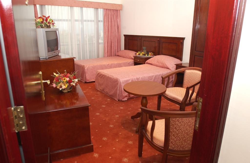 City Center Hotel Manama Værelse billede
